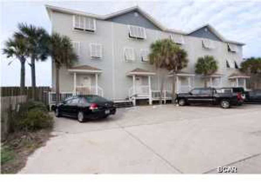 End unit just sold for $580,000!!! Almost $75,000 in rental income! Incredible 3 story, Gulf-front condo that lives like a townhouse. Beautiful, spacious home with 4 bedrooms, 4.5 baths and over 2,200 SF of living space. Perfect vacation home or permanent residence. This luxurious condo is immaculate inside, high ceilings, freshly refinished oak hardwood floors, granite counter tops, crown molding, stainless steel appliances, wainscoting, wet bar with wine cooler, carpet in bedrooms, new paint, new decking, new A/C unit, exterior has been completely replaced and water-proofed with extensive testing performed...First floor has half bath, tons of storage and open floor plan kitchen with dining and living area with wet-bar, and two sets of sliders to a huge Gulf-front deck. Gulf views