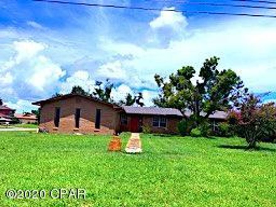 Wow, what a price reduction! Here's a great opportunity to own a large 5 Bedroom, yes 5 BEDROOMS.  This is a solid  brick ranch, in a neighborhood of similar style, large, stately homes.  This home has new carpet, new cabinets and new roof, new sheetrock! The 2 car garage has built-in handicap accessible ramps and the large corner lot has plenty of room for a pool, RV or lots of toys.