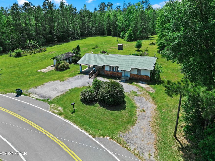 CURRENTLY UNDER CONTRACT, SELLER WILL CONSIDER BACK UP OFFERS.  
If you are looking for privacy on a beautiful lot just a short drive from town, this may be just the place for you.  This 2 bedroom 1 bath home on 3.75 acres with no visible neighbors is partially cleared with beautful trees and a wooded section in the back.  The property is not located in a flood zone.