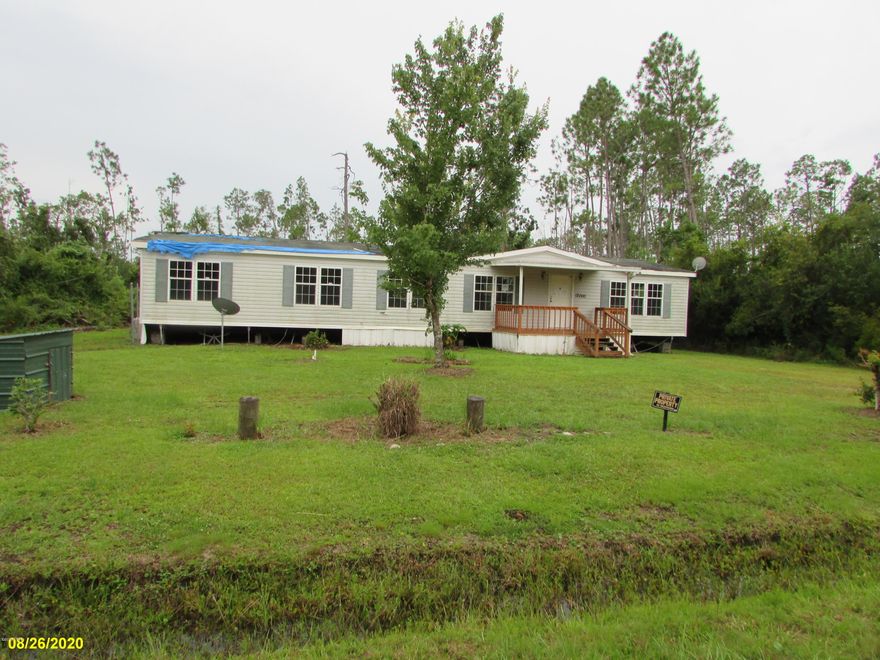 Looking for the perfect place to build your new home? Well look no further. Located in Northern Bay County sits .30 acre lot with a well and septic. There is a mobile home on the property  that is  severely damaged from Hurricane Michael and has no value. Located 30 minutes from Panama City and 45 minutes from The Northwest Beaches International airport. Call today for more information!