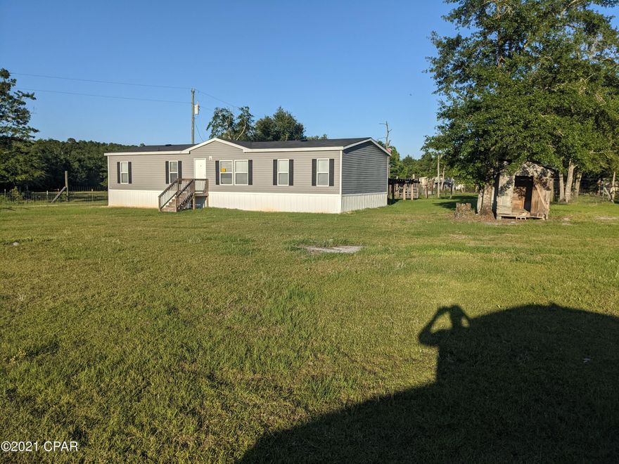 Nice, 3 Bedroom 2 Bath Home in Hosford! This Split Floor Plan home boasts and open style concept with a living room that flows through a large kitchen, and into the the den. The  This home rests on 1 acre that features well, septic, multiple out buildings and fencing. Schedule your Showing Today!