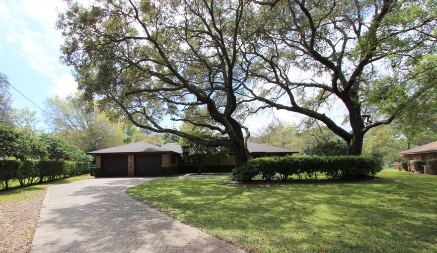 Fabulous opportunity to purchase a 1-owner corner lot, 240' canal front home with in-ground pool, 3 bdrm/2 ba with over 2000 sf.  The home has been meticulously maintained and updated, including the kitchen & both baths, split bedroom plan, custom wood blinds throughout, heat pump installed in 2009, Andersen Low E windows & French doors (3 sets), FP has external source for combustion air, tons of storage throughout, shop w/separate AC unit, separate 322' well for irrigation, screened porch, 16 X 32 in-ground pool, 1 Yr Home Warranty and NO Flood Ins required! Also 1/5 of park in front of home conveys with sale. This home is solid and ready for you to call it home - call your Realtor today. Thank you for considering this home.