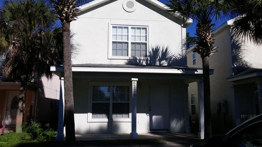 2-story home with ceramic tile and carpet, breakfast bar,french doors leading to backyard balcony, washer and dryer connections, privacy fenced back yard, and close to the Navy Base.