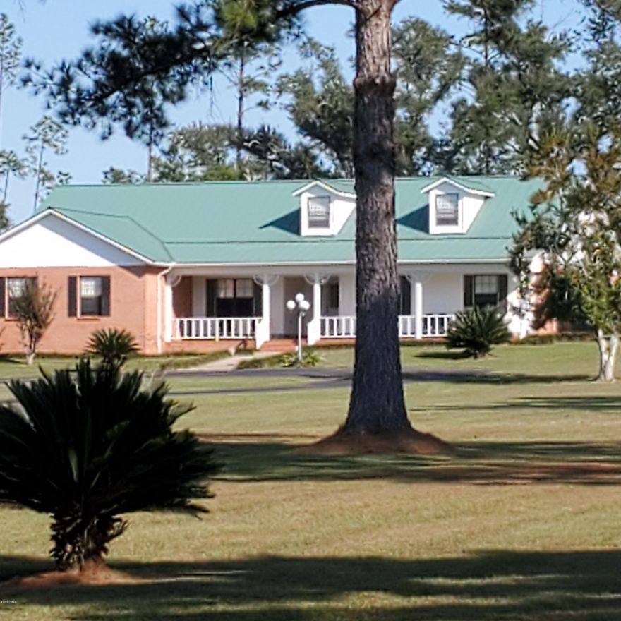 This beautiful County Home on 4.78 acres could be Your Forever Home!  The Split floor plan with large master bedroom with large bath, walkin shower and large closet and 3 good size bedrooms on the other side with large bath are perfect for any size family.  Beautiful Great Room with open beam and stone fireplace.  Large Kitchen with lots of work space and cabinets.  If you need a large Steel Beamed Workshop - this is it!!  Room for all your equipment, large rollup door, kitchenette and full bathroom!  Fenced back yard with garden space and lots of fruit trees.  This is a beautiful place to call Home!