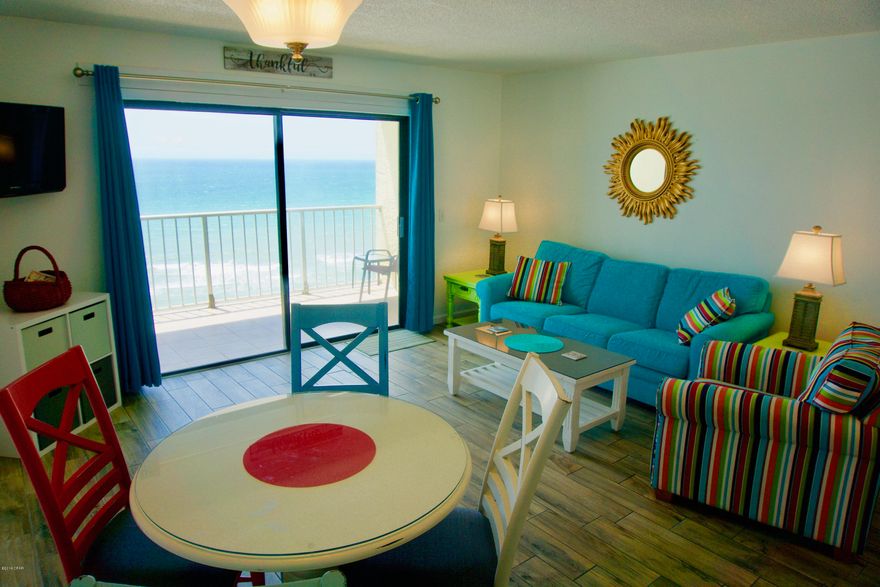 If you are looking for a RENOVATED gulf front condo, look no further, here is the unit you have been waiting for.  See the video under ''photos'' for additional walk through coverage of this unobstructed Gulf Front unit. This Tastefully decorated unit sleeps six comfortably with the master bedroom, twin bunk area, and the sofa-sleeper.  The king mattress and the queen sleep sofa are both newer.  Featuring numerous updates over the last few years to include in 2017 new wood look plank tile flooring throughout for easy maintenance (no carpet), new interior paint, new baseboards, door frames, bathroom mirrors, and the wall-to-wall living room mirror was removed.  The kitchen and bathrooms have gone through a renovation over the last few years to include (enter on more for additional write-up) new custom cabinets and vanities, new countertops, hardware, tiled backsplash in the kitchen, and the old tub was removed and replaced with a cultured wall surround-seamless walk-in shower.  The owners have taken pride in this unit and it has been decorated with a fun beachy theme with many furniture pieces being newer.  Additional updates include: New Slider 2011, New Toilet-2016, Water Heater-2015, A/C Parts Replaced-2013, New Condenser and Fan-2009.  If you are not familiar with The Summit, it is the place to be. This resort has more amenities than most condo complexes on the beach to include: Gated 24-Hour Security, Two Oversized Pools, 2 Designated Children's Pools, 2 Whirlpools, Large Pool Area with Grassy Sitting Area, Large Indoor Hot Tub, His & Her Sauna Steam Rooms, Lighted Tennis Courts, Shuffle Board Court,  Poolside Tiki-Bar, Arcade Game Room, Owners Lounge, Beachside Gated Playground, Summit Market Convenience Store, Bikini-Bobs Restaurant, Charcoal BBQ Grills, Beach Volleyball, Onsite Laundry Facility, and Beach Services is available for all your favorite Water Sports and Beach Chair Rentals.  This resort is within walking distance to some of the best restaurants, clubs, and area attractions which makes it one of Panama City Beaches prime rental condos. If thats not enough, the association dues are some of the lowest around at $1092 p/qtr and even include cable and internet.  Call today for your private showing before its gone!  Age, Sq. Ft., Taxes, Room Dimensions, are all an estimate and if important by the buyer must be verified via inspection or appraisal.