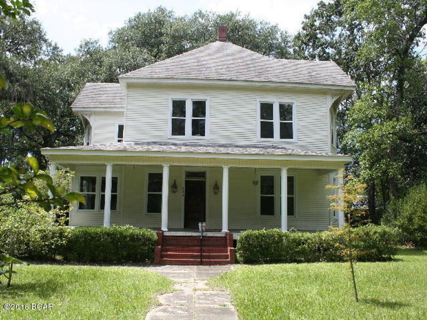 * PRICE REDUCED * Lovely 3 story home just waiting for large family to enjoy! This home has had updates with a very modern kitchen with updated appliances, a fireplace and eat-in area. There is a foyer, formal living room, formal dining room, master bedroom downstairs with fireplace and even has a completely furnished kitchenette. Several fireplaces throughout; high ceilings and lots of atmosphere! Lot is extra large with yard building and it is completely fenced with entrances on 2 streets as the house sits on a corner lot. There are a few areas that need some repairs but this is a really, really great opportunity!