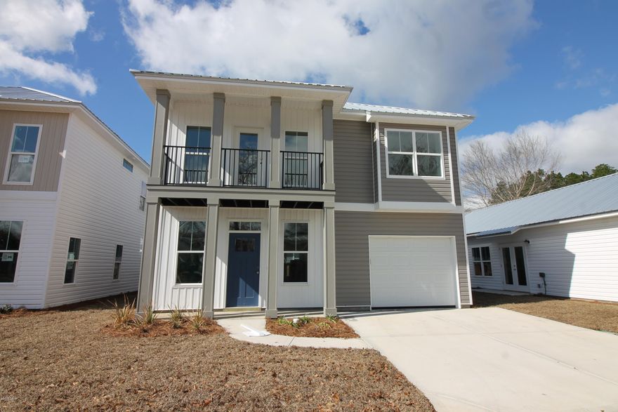 Beautiful New homes in a new community close to Tyndall AFB. This home is built with energy savings in mind. Metal Roofs, Custom cabinets, Quartz counter tops, tile, carpet in upstairs. This is one you don't want to miss. Community offers parks, paver streets and driveways, and Lawn care is covered in your HOA Fees. Perfect Location and the price is right
