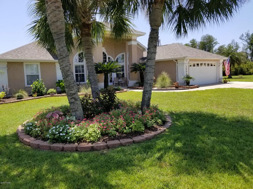 Beautiful southern exposure pool home in quiet cul-de-sac. Enjoy sunrise and sunset pool-side from your pergola or upgraded lanai with decorative lighting. New (2018) Cox 15x30 gunite salt water pool with pool shelf and underwater lighting. Boat pad and RV parking. Enter the pillared home through leaded glass front door into the foyer with beautiful marble flooring, a formal dining room and  an office with French doors. The vaulted foyer opens to the great room with plank hardwood flooring and gas fireplace. Nearby the dinette space is the updated kitchen, with granite counter tops, breakfast bar and pantry. Beautiful master bedroom with tiled bathroom, jet tub and shower,split floor plan. Two more bedrooms with full bath and half pool bath off the lanai.