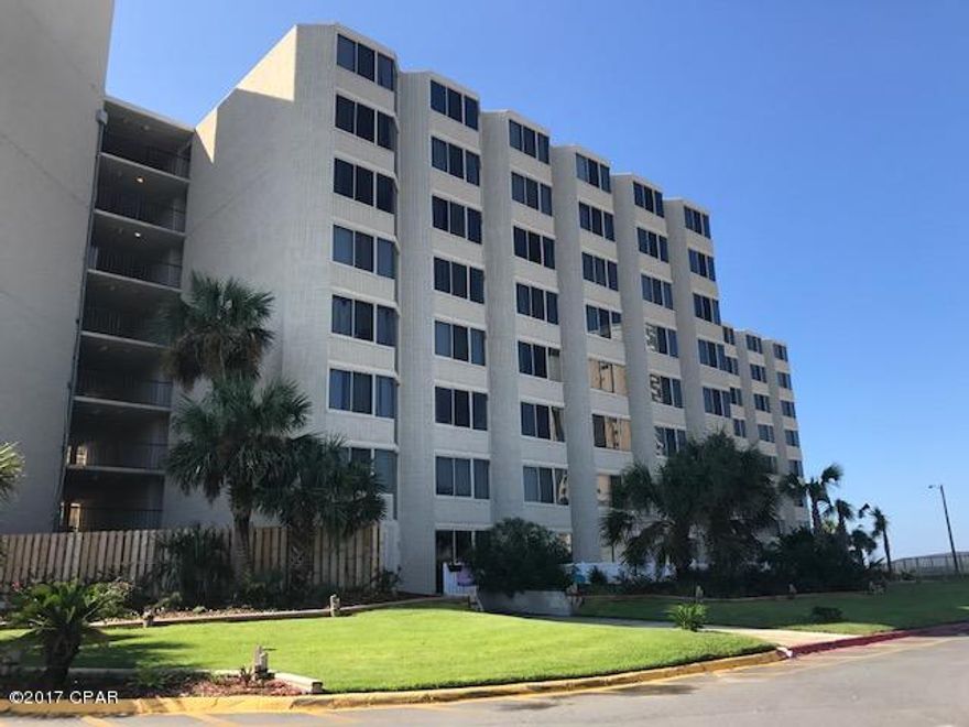 Great rental potential! Mid-rise right on the Gulf! Private condo tucked away on our beautiful Emerald Shores. 489sqft efficiency, two queen beds, dining room, and remolded kitchen. Walk in closet is large enough to make into a bunk room! Lot's of amenities, shuffle board, gazebo, pool, outdoor snack bar open most of the year. And only a few steps to the beach!!