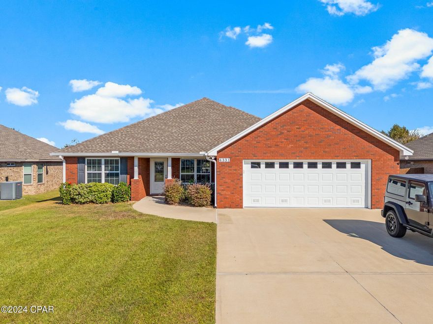 'CURRENTLY UNDER CONTRACT, SELLER WILL CONSIDER BACKUP OFFERS' 
Welcome to this immaculately maintained 4-bedroom, 2.5-bathroom brick home, designed with durability and elegance in mind. Built to a 140mph wind code, this home ensures peace of mind and security. Inside, custom construction enhances the spacious living and dining areas, while the kitchen features custom hardwood cabinets and a breakfast bar. The split floor plan offers privacy, with crown molding and hardwood floors throughout. The master suite includes a double vanity, separate shower, jetted tub, and walk-in closet. Additional highlights include an oversized 2-car garage with additional space for a workshop or storage, new water heater, new roof, recently replaced windows, and an outdoor shower with hot and cold water. This home is also wired for a generator, and the eves of this home are fitted with outlets making this home ready for any season. The back yard is fully fenced, you will also notice an irrigation system, newer HVAC system and an extra wide driveway perfect for RV, camper or boat parking.