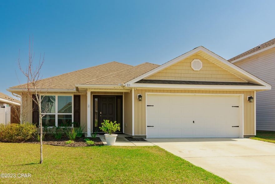 Welcome to this beautiful, meticulously maintained home in Bridge Harbor!  Upgrades include kitchen backsplash, dining room crown molding and chair rail, laundry room counter and cabinet, garage epoxy floor and enclosed back patio.  This Boston 3/2 plan boasts a large kitchen and family living area.   You'll love the master bedroom retreat that is separate from the additional bedrooms.  The outdoor living space is sure to please with a covered front porch, screened in back patio, backyard privacy fence on both sides with iron fence at end of property allowing you to take in the view of the pond and the sound of the water.  Bridge Harbor is a family friendly neighborhood with a community pool and nearly surrounded by St. Andrews Bay which makes it a great place for water sports, fishing and more.  Bridge Harbor is conveniently located only 10 minutes to Tyndall AFB, 15 minutes to Panama City and 20 minutes to Mexico Beach.