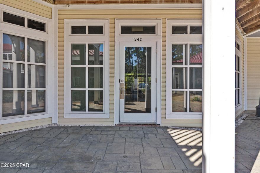 Ground level & upstairs units for office or retail space, conveniently located near Hathaway Bridge on East end of Front Beach Road, PCB.

This space is all open, except for a restroom and storage closetin each unit that is approximately 1,008 sf per unit.  Entrance to space from the street and from the center of the mall.  2nd floor unit only entrance from center of mall up the wooden steps to the left of the ground floor unit.