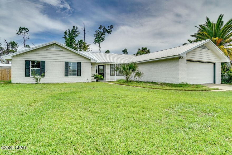 DO NOT MISS THIS ONE!  Beautifully updated 3 bedroom/ 2 bath home in the heart of the city.  This bright, fully remodeled home features high end upgrades, with updated flooring, upgraded lighting, fully tiled bathrooms and a beautiful kitchen with bar seating.  It doesn't stop there- the magic happens when you walk out to your fully landscaped backyard paradise with flagstone pavers, and a seating area with plenty of outdoor fans to help keep you cool.  The backyard has a beautiful inground pool and Jacuzzi spa- the perfect space to relax.  Just a block from W 23rd St and all the shopping and restaurants you can imagine.  This one will not last.  Come take a tour today!