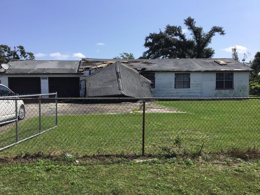 Hurricane damaged property with possible potential as your next home, rental, or flip. Home features almost 1900 Sqft. with a two car garage, storage area, and shed in fenced in yard. Schedule a showing today! 

** Sold As-Is. Home built prior to 1978. Hold Harmless must be signed prior to entry due to condition**