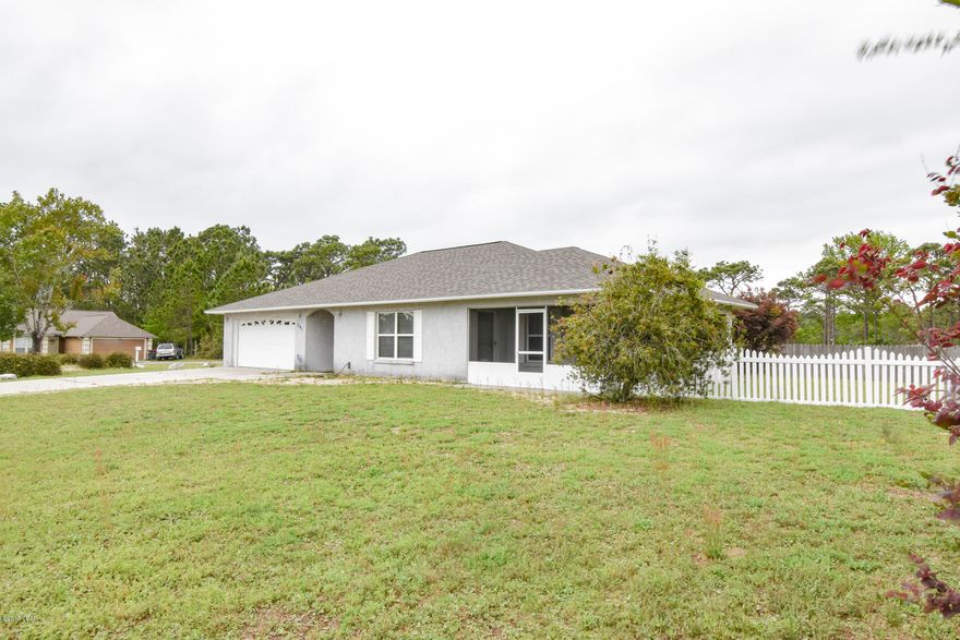 CURRENTLY UNDER CONTRACT - SELLER ACCEPTING BACK UP OFFERS!!! Welcome Home! This charming open floor plan, handicap accessible home was built in 2002 and is centrally located to the beach and town on a corner lot with a large yard for plenty of room for children, fur babies or your own personal privacy. The backyard is perfect for those afternoon playdates or for grilling out and entertaining complete with a screened-in porch! Due to some missing shingles after the storm, a new roof was installed this year! This home was built to accommodate the disabled with wide hallways and doorways and a very nice, large, tile, zero entry shower in the master bathroom. The kitchen has a farm sink, lots of cabinets and a huge pantry. Please verify all measurements if important.