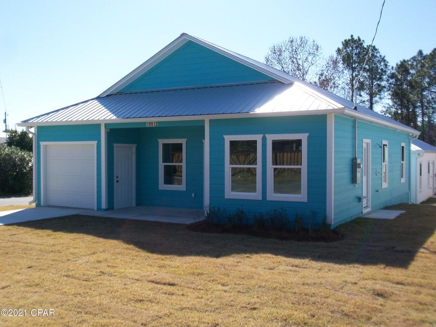 NEW 2021 Storm Rated Beach House with hurricane impact windows and doors . Metal Roof with hurricane tie downs .Concrete siding on raised concrete slab .Large corner lot.

 Beach side of Hwy 98 in Laguna Beach.

Take golf cart to your Dedicated Beach! 



   Waterproof LVP flooring throughout, shaker cabinets, quartz counter tops, stainless appliances, subway tile backsplash in kitchen, tray ceilings in living room and master bedroom, laundry closet, ceiling fans, recessed lighting,  

 Sod lawn with sprinkler system.  Additional setbacks from street in front and on side add large useable area, privacy, and guest parking.