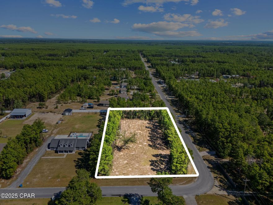 CURRENTLY UNDER CONTRACT, SELLER WILL CONSIDER BACK UP OFFERS. Discover the perfect canvas for your dream home on this 1.19-acre vacant lot, ideally located in one of Southport's most sought-after rural areas. Positioned directly across from Deane Bozeman High School, this property offers both convenience and privacy. The land has already been cleared, leaving only the beautiful perimeter lined with tall pine trees, creating a natural border and serene setting for your future home. With ample space to design a custom new-construction residence, this lot is ideal for those seeking both quiet country living and proximity to town. Just 15 minutes to Lynn Haven and only 35 minutes to Pier Park and the white sandy beaches of Panama City Beach, you'll enjoy easy access to shopping, dining, and coastal entertainment while retreating to your peaceful property. Don't miss your chance to own land in a growing area with endless potential!