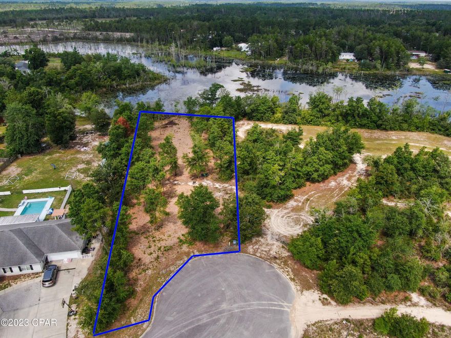 Check out this buildable lot, almost one acre in the subdivision of Mill Creek. Lot is off of a cul-de-sac on a paved road. Seller has cleared trail leading directly to water.