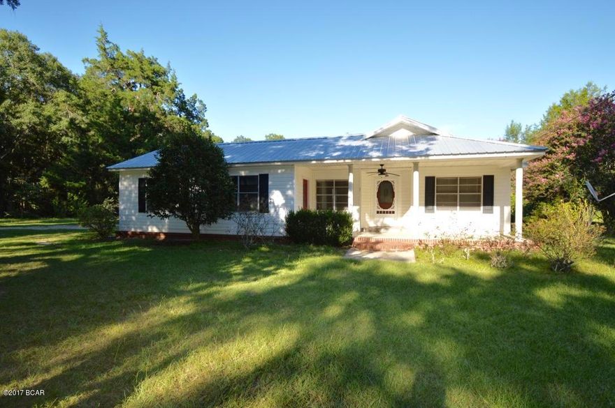 This property is a slice of paradise!  This 55.5 acre property features two well stocked ponds, fruit trees galore, and a smoke house.  10 acres are currently being used for cattle.  This charming farm house is full of potential and features a newer room and beautiful appliances!  There is also a former home site located on a portion of the property that features an additional septic tank.  Includes two parcels:  00000000-00-0207-0001 and  00000000-00-0206-0001.