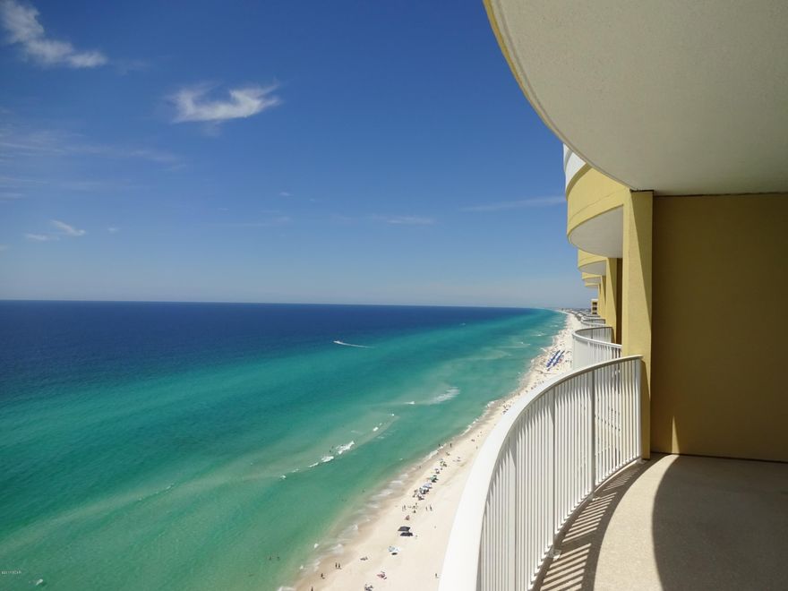 23rd (top) floor condo that the owner has never rented out. Unit is move-in ready and  beautifully furnished and nicely appointed throughout. Miles of breathtaking views of the beaches and the Gulf of Mexico from the large rear private balcony. Interior features granite counter tops, crown molding, washer & dryer, ceiling fans, owners closet. Emerald Isle amenities include two pools ( one heated seasonally ), fitness center, sauna, community room, BBQ grilles, beach chair / umbrella services. This unit also includes a covered, deeded parking space and storage unit. Conveniently located to Pier Park, Fine dining, Family Entertainment and sports venues. All measurements and info must be verified by buyer.