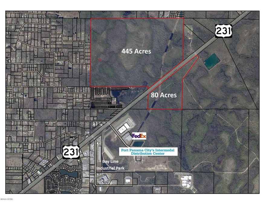 Approximately 80 acres with +/- 3,700 feet fronting U.S. Highway 231 with a median-cut on the north end. This property is currently zoned AG-1. Located in Bay County and just 1/2 mile north of the main entrance to Port Panama City's Intermodal Distribution Center. (Commerce Boulevard.  With land use change to industrial and incorporation into Panama City limits, the property would make ideal commercial or industrial site and is located adjacent to the Intermodal Distribution Center. The new 250,000 sq. ft. FedEx distribution center is now under construction. Rail Service available.  Measurements are estimates only.