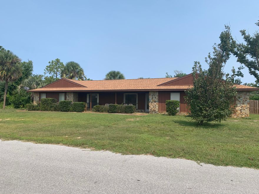 BACK ON MARKET. Ranch style home on over .5 acre in Northshore. 3 bedroom 2 bath with very large living room and wood burning fireplace. Home has side entry garage with new privacy fence and new deep well.

Exterior storage building and washer and dryer convey.