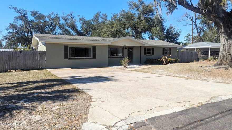 Are you looking for a great Lynn Haven home in move-in condition?  Here it is!  This spacious home has plenty of room for your family and is located in one of the best school districts around!  It has just been remodeled and is ready to go.  The kids and dogs can play in the huge privacy fenced backyard that has a beautiful grove of oaks in one corner, a perfect place to sling a hammock and take a nap. If you like to entertain, the den is large enough for a pool table and the screened back porch with its own side-by-side refrigerator is just right for grilling and outdoor dining. Tile floors throughout mean easy cleaning, and the solid concrete block construction means low maintenance.  New paint inside and out, new lighting, new kitchen fridge, new over-range microwave, new granite counters in the kitchen, a new main HVAC system, new hot water heater, and a five year old roof. * All Information provided by the Seller and deemed accurate and correct. Suggested buyer verify all information provided in this listing.