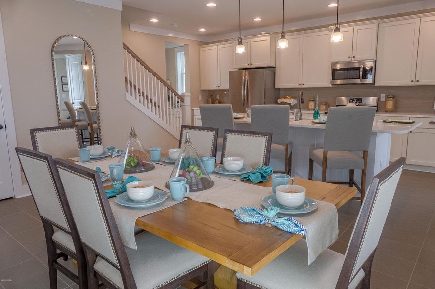 This home features the Captiva floor plan with  Classical Elevation. Samuel Taylor homes are truly one of the best constructed homes in Bay County. We build our homes with 2x6 exterior studs vs other builders using 2x4's. Not only is it a stronger home, but this also allows us to put R-19 in the walls instead of R-13.  We also use R-38 in our ceilings vs R-30 like most builders. We insulate most of the interior walls to make a very quiet home. SS appliance package is standard along with brushed nickel faucets, security system, 8 ft. doors throughout, granite counters in kitchen and baths, raised vanities with under mounted porcelain sinks, SS gas oven, oversized tiles, upgraded carpet with 8 lb. padding and much more. A craftsman style trim package adds to the character and uniqueness of our homes. Choose from 3 exterior elevations: Classic, Coastal, or Boat builder. Pick from traditional style garages or our detached garages with optional carriage home above, perfect for the college student, guests or in-law quarters.
   SweetBay offers biking and hiking trails, a boathouse to launch canoes, kayaks and paddle boards, a permitted marina, community pool (construction to start 2016), several parks, ponds, children's playground, planned township with a major grocery store and many shoppes. Everything is within a 5 minute walk or less.  University Academy is the center of this beautiful community. The Academy is the #1 school for math and reading for the Bay County District. Your children are automatically enrolled with purchase of a home. Currently there are over 800 on the waiting list to get in to the school. Come see what everyone is talking about!