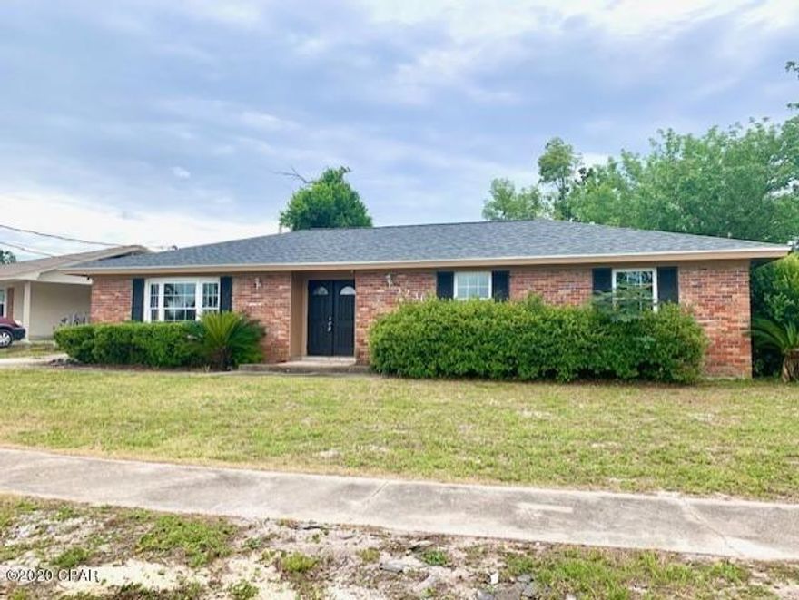 Price reduced, 18 minute drive to PCB! Wonderful location for an all brick ranch  with 3 bedrooms, 2 baths, a Living Room and  Den.  This home has had many updates in the past year, to include a new roof, insulation, ceilings, sheetrock, flooring and paint, doors/trim and windows.  The kitchen boasts granite countertops and wood cabinets.   Sliders in the den open to the rear patio whree there is plenty of room in the back yard for pool or bbq.  Close to 23rd St, Beck Ave, and Lynn Haven.All info is approx. (Buyer to verify any info that is important.)