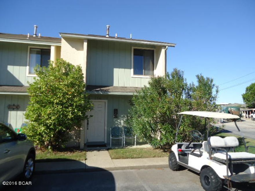 Age, SF, and dimensions approximate. Nice ''Glassback'' in very good condition. End unit. Completely tiled downstairs. New roof in 2017. Very close to mini-golf. Complex has 11 pools to include clubhouse with pool at the beach. Gated community and pet friendly.