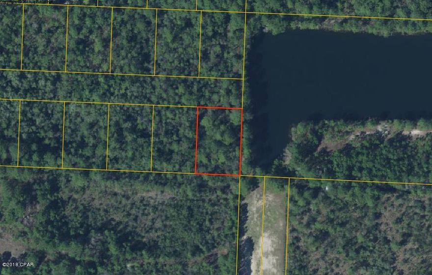 Measurements and data are approximate, please verify if important. LAKESIDE lot!  Oversized lot located at the very end of a nonexistent road (no through traffic) and borders a lake on the other side (no neighbors and a view). Currently, no road access.  Seller is licensed real estate broker.