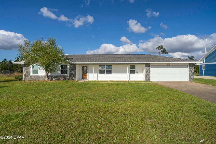 Adorable home with spacious yard and lots of storage!  This 3 bedroom, 2 bath is located in the Sandy Creek Ranch and Country Club subdivision.  If you are looking for something that is just outside of the hustle and bustle of town living, but close enough to get to one in less than 10 minutes, don't miss your chance to see this beautiful home!