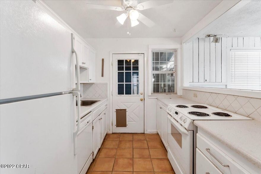 Come dream up your touch on the Cove's ''super cute'' Southern Florida cottage in Panama City. Priced to sell quick! This 3-bedroom frost blue or florentine cedar siding will have you thinking how close you are to the water here. Straight down Cherry Street you can catch some of the most breath-taking sunsets along the boardwalk. Bay County Schools release their overall B rating in July 2022, with the elementary school just down the street and the Sudduth Park just north down the alley. The 2nd bath and laundry hookups is just through the covered breezeway to the cabana which the sliding glass door leads to the private gunite in-ground pool and jacuzzi surrounded by the decking with brick and pavers throughout the backyard leading up to the garden areas and the back 12'x8'workshop or shed The Roof was completely replaced in 2019, the HVAC and water heater were already in place when they bought the house in 2006, they may have been 5 years old then. 

In 2016 all the main house windows were replaced, owner believed they are high impact, double pane. 

The house did shift some with the Hurricane Michael in Oct 2018 but they got an engineers report saying it's structurally sound (report available) but no water got in the actual house.

Back Deck was replace possibly about 2018.

In bedroom the wife went through ceiling 2007, but bad repair job. 

Possibly as of 10/21/2022 a sign was put up about no accessing the alley in front of the house but to go around, that it is a one-way and directionals painted on the alley street. Buyer to verify information regarding the alley and access to parking for the home.

Other features include: Close to downtown, DYI shiplap in the living areas, wine rack over sink, built-ins and shelving in the bedrooms, sliding closet doors, medicine cabinets in the bathroom, wooden privacy fence, outdoor shower, pet doors, hardwood and tile throughout, window A/C unit in the cabana house, Honeywell alarm panel, built in bench outdoors, oak trees in the back yard and you may find some leftover bamboo that was accidentally cut down. Some paint, wall and ceiling repairs needed in living room and primary room, has been repaired since Hurricane Michael. City of Panama City for trash, water and sewer, Florida Power for electricity. Pool to be serviced through to closing. Easy show and vacant! Must go!