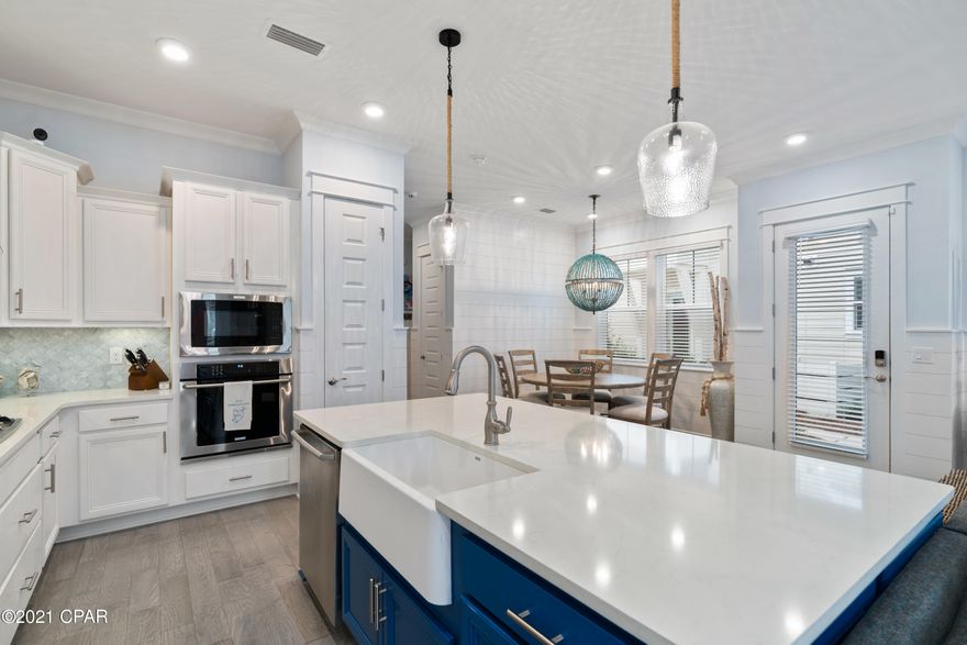 Under contract - seller accepting back up offers. Less than 2 years old, never been rented and with every upgrade imaginable, this is your chance to own a custom-designed, fully-furnished, 3-bedroom A-unit in the desirable community of Prominence. This immaculate home features an electric fireplace with custom built-ins, shiplap throughout and uniquely-tiled stair risers. Design features include a real turquoise dining chandelier, built-in bunk beds, wallpaper in the baths and custom trim work accent walls with a coffered ceiling master suite. The kitchen is a dream with Electrolux appliances, gas cooktop, quartz countertops and a white farmhouse sink. With real hardwoods and garage epoxy flooring, not a detail was missed in this design. Lower HOA and includes beach shuttle, pools, fitness & more! Prominence North is located across from The Hub where you'll find live entertainment, restaurants and shopping. This highly desirable neighborhood on 30A is one of the fastest growing areas for a family-friendly lifestyle and an investors paradise. Buyer to verify all dimensions and information.