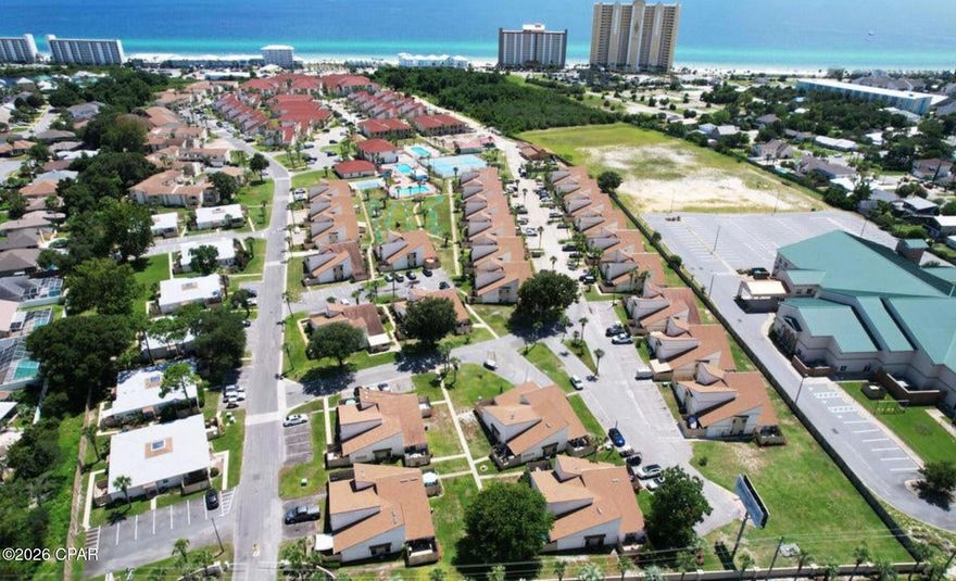 Turnkey investment opportunity with proven income potential! This fully furnished 2-bedroom, 2-bath unit in Horizon South boasts an impressive rental history, generating over $58,000 in 2023 and $47,000 in 2022--making it an ideal choice for investors or those seeking a vacation home that pays for itself.

Inside, you'll find a comfortable and inviting layout designed for both relaxation and functionality, with everything in place for immediate rentals or personal enjoyment. 

Owners and guests alike enjoy access to an unmatched array of resort-style amenities, including a private beach entrance, mini golf, four swimming pools (one heated for year-round use), hot tub, fitness center, game room, and community spaces. Stay active with tennis courts, basketball, and shuffleboard--all within this gated, amenity-rich community.

Whether you're looking to expand your portfolio or secure your own slice of paradise, this property delivers both lifestyle and income.

Rental history available upon request. All measurements are approximate and should be verified if important.