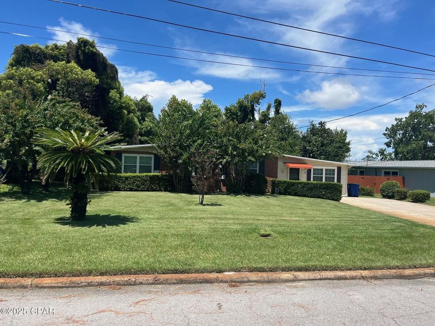 CURRENTLY UNDER CONTRACT, SELLER WILL CONSIDER BACKUP OFFERS***New Price Improvement*** and Seller now offering a buyer credit of $10,000 with an accepted offer. Move in ready - A rare find in the heart of Panama City, this 4-bedroom, 2-bath split bedroom home offers 2,202 sq. ft. of living space plus a 15' x 20' Florida room and a 16' x 20' detached workshop with electric. Located just minutes from 23rd Street retail, restaurants, medical services, Downtown, and St. Andrews—with quick access to 15th St., Hwy 231, and Hwy 390—this home combines convenience with comfort.

Recently refreshed & remodeled with modern updates, including LVP flooring in the main living areas and primary suite, new light fixtures, ceiling fans, outlets, switches, paint throughout (walls, ceilings, kitchen cabinets), updated baseboards, appliances, bath vanities, door hardware, hinges, plumbing fixtures, and faucets. The Florida room features new carpet, lights, and ceiling fan, and opens directly to a covered grilling deck—perfect for outdoor cooking and entertaining. Previous improvements include granite kitchen countertops, upgraded cabinetry, insulated windows, HVAC, and roof covering.

Multiple gathering spaces include a large living area, separate den, spacious dining room, and a bright Florida room with vinyl windows. Outside, the fenced backyard features a shallow well with sprinkler system, and the spacious yard offers room to relax or garden. Irrigation well and sprinkler system. 

If you're looking for location, updates, and space to spread out—this is the one.

 All measurements are approximate. All information is deemed reliable but not guaranteed. Buyer to verify all pertinent information to their satisfaction.