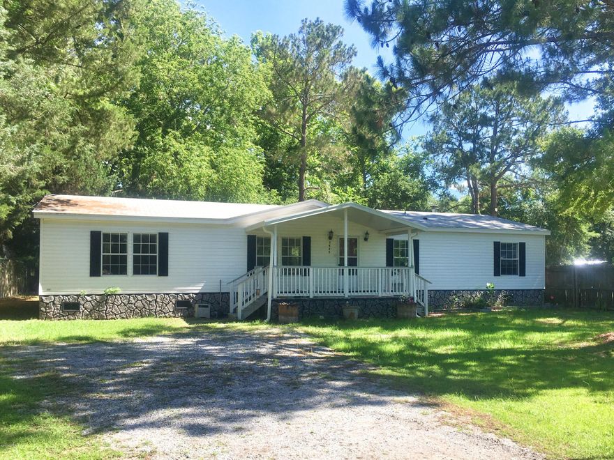 Move-in Ready! Spacious home located on a quiet cul de sac in Callaway-- super convenient to Tyndall Air Force Base, Eastern Shipyard, the Paper Mill, schools, shopping, etc.  All of the rooms are spacious & comfortable--especially the kitchen, which is open to the dining area and family room. That kitchen also boasts oak cabinets, wall-mounted oven & microwave, & an island containing sink & dishwasher that faces toward windows overlooking the large, shaded back yard. The 13x20 Family Rm has cathedral ceilings & woodburning fireplace. Master Suite has awesome walk-in closet, garden tub & separate shower. You'll also love the WONDERFUL 12X23 screened porch; plus privacy fenced back yard w/ workshop,updated lighting & fans throughout. VERY NICE, VERY AFFORDABLE, GREAT CONDITION inside & out!