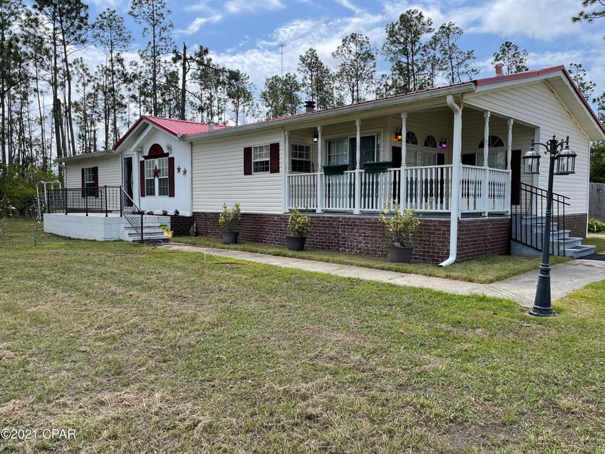 Are you looking for peace and quiet but still want to be close to town? This home is right for you! 2012 Greenwood Way is a well cared for 3/2 home on over an acre of land with a new above ground pool! There are 2 front porches for you to sit and have a morning cup of coffee. Relax and enjoy your pool on the large back deck or sit and watch the turtles in the pond. Inside the house you have a kitchen with great space and an eat in dining area as well as an another dining area that joins the living room. The living room has large windows for natural light and has a wood burning fireplace to keep you warm in the winter. The large master suite has double vanities, a walk in closet, and a big soaker tub. The house has a split floor plan to offer privacy! Schedule your showing today. All measurements are approximate. Buyer to verify if important.