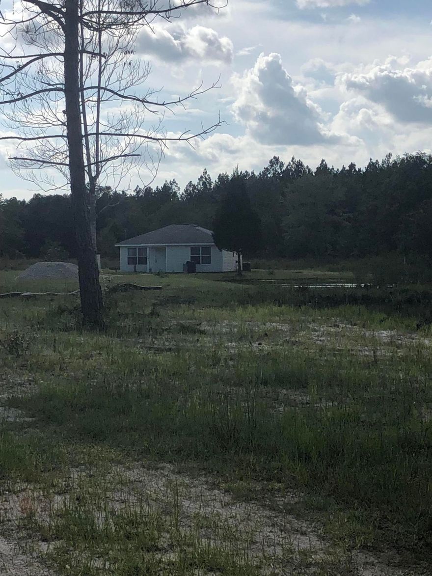 measurements are appoximate....country living on 10 acres in this recently updated home....Three ponds, lots of land, about half cleared!  Quaint home has laminated wood flooring, bathroom with stand up shower, moderate size bedrooms.  No nosey neighbors here!