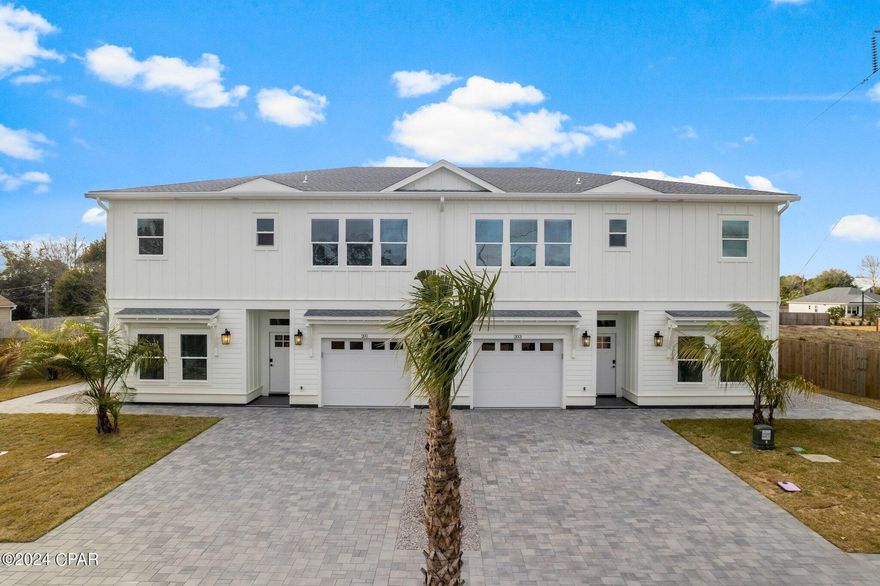 Stunning new construction 4-bed, 3-bath town house on the West End of Panama City Beach in the gated community of ''Laguna Haven''.
This new construction boasts modern amenities including soft close cabinets, quartz countertops, Samsung appliance package, tiled walk-in showers, electric fireplace, etc. The first floor offers flexibility with an office/secondary bedroom, while the second floor features a luxurious primary bedroom and two additional bedrooms with a shared bath. Enjoy natural light throughout, keyless entry, one car garage and a paved backyard with a custom pergola. Just minutes from the public beach, close to Frank Brown Park, Pier Park, local restaurants, this is coastal living at its finest.
Embrace the allure of contemporary living in this brand-new construction, where every detail speaks of modern elegance and experience a lifestyle of comfort at 201 N San Souci Street.