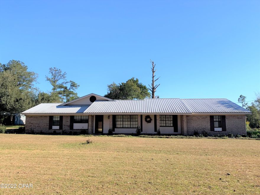 CURRENTLY UNDER CONTRACT, SELLER ACCEPTING BACKUP OFFERS.This spacious country home is sitting on 6+ acres of land with one acre being directly across the street! The inside of the home holds TWO separate living rooms - one holding a fireplace! The kitchen has an open concept feel with a sliding glass door that opens up to the back porch. This is the perfect combination to start your day with a cup of coffee on the back porch surrounded by the peaceful, quiet, country lifestyle. If you are the hunting type, walking to your blind would be shorter than the walk to the mailbox! There is a clearing right behind the home - making for a perfect food plot. If you don't want to be too far from the city, this is the perfect location as Tallahassee is only a 40-minute drive away!