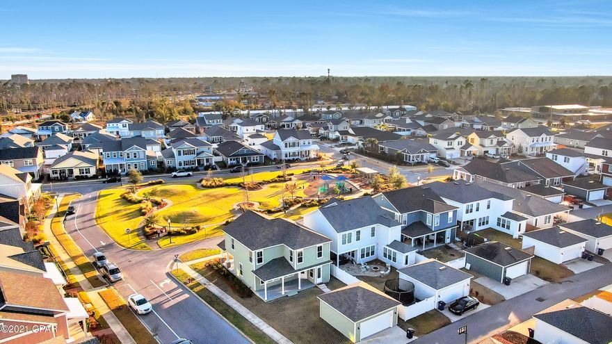 Welcome to Sweetbay! This 2-story, popular ''Captiva'' floorplan offers 3bedrooms, 2.5bth plus bonus area upstairs. The home is situated on a corner-lot, with direct access to one of the neighboring parks. This nearly new home interior offers wood grain tile plank flooring throughout the first floor which includes dedicated dining area/office space as you walk in and half bath for guests. Leading into the living room, you will find plenty of natural light which opens into the spacious kitchen. Plenty of storage with all-new shaker style cabinets, done in modern 2-tone finishes with the island offering additional storage all the way around. Stylish granite countertops as well as stainless steel appliances with natural gas, make this an ideal place to cook up your favorite meal. Just off the kitchen is an additional space that could be turned into a butlers pantry or coffee bar, in addition to a large walk-in pantry with additional cabinetry for more storage or house a deep freezer/wine cooler, etc. Custom stair handrails will lead you up to the second floor, with all new carpeting througout. Second floor features two spacious bedrooms, one features it's own walk-in closet. Spacious bonus area as well as full hall bathroom with shower/tub combo makes for plenty of space for those that need split entertaining for family members. Master bedroom you will find has tray ceilings, additional "bump out" that could be used as a sitting area/vanity/office desk. Master en-suite offers oversized custom tiled shower, seperate water closet, double-vanities and spacious walk-in closet. Laundry room is also located upstairs with washer/dryer to be included. Detached garage with alley access. 

Sweetbay is a golf-cart friendly community, within walking distance to the areas top rated K-8 charter school, University Academy. Neighborhood amenities include: resort-style swimming pool, pool house, basketball court, walking trails, access to the bay for kayaks, parks/green spaces, etc. Sweetbay also hosts numerous community events throughout the year and also the future home of the upcoming neighboring towncenter that will be walking distance or short golf cart ride to shops, services and more! 

All sizes/measurements are approximate; please verify if important.