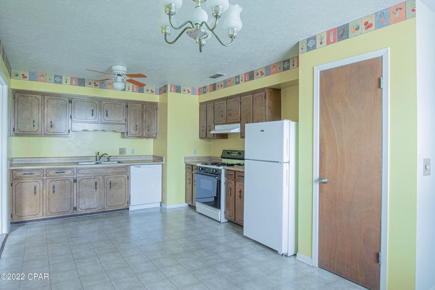 **CURRENTLY UNDER CONTRACT, TAKING BACKUPS.  Here's your chance to get a lot of square footage for a reasonable price, so you can put your own stamp on a home.  The home has a newer roof, water heater and finished garage space.  The windows are only 8 years old.  Gas stove and water heater.  Solid brick home in quiet community with a spacious yard.  Home is not in a flood zone.