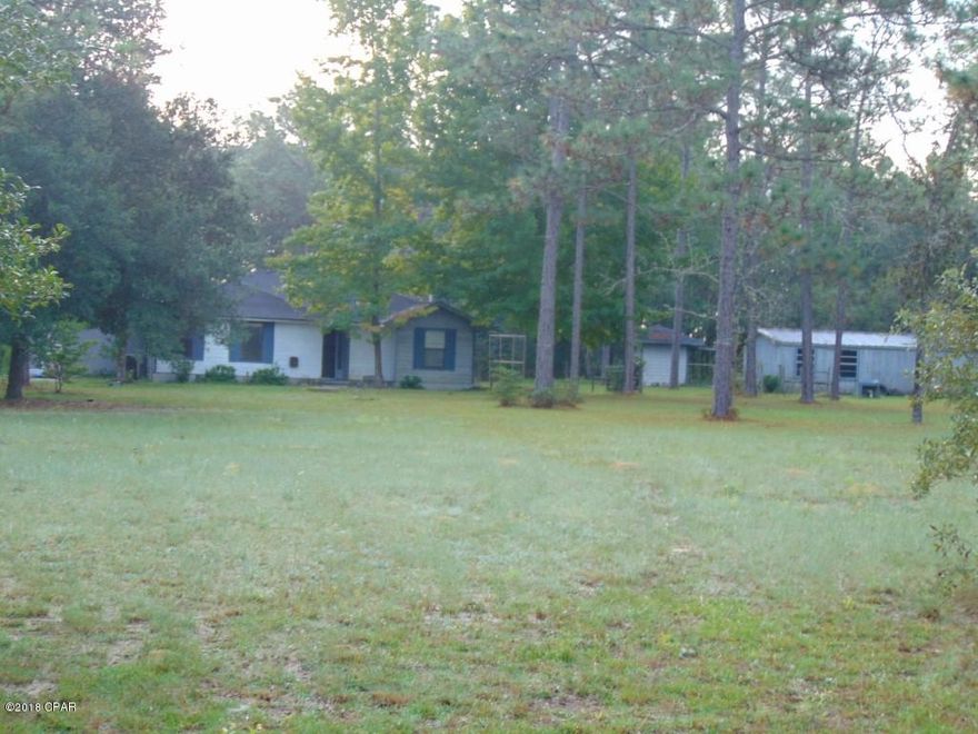 REDUCED!!! Three bedroom two bathroom frame home on almost 10 acres in a horse friendly area offered as is.  The  lot has a shed and work shop.  All sizes are approximate or taken from other sources please verify accordingly.