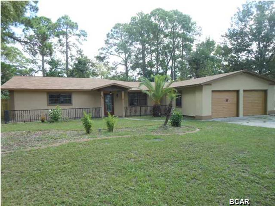 CONGRATULATIONS! By reading this you now have the opportunity to purchase a home in LYNN HAVEN and the BEST PART IS, IT HAS JUST BEEN REDUCED !! A NEW ROOF was installed in 2013, and the full interior was painted in 2013 as well!! NEW stucco was added on 3 sides, some NEW side privacy fence completed, including some minor repairs !! There's just not much more you could ask for !! Location, location, you hear those buzz words all the time. Well this time it's true. You are just minutes away from the Lynn Haven shopping area. You especially want to check out the Great Parks including the waterfront ones that Lynn Haven offers. The home is one of those rare ''ready to move in'' homes that's ideal for a large family ! This huge, 3 br 2 bath home is complete including a monster size