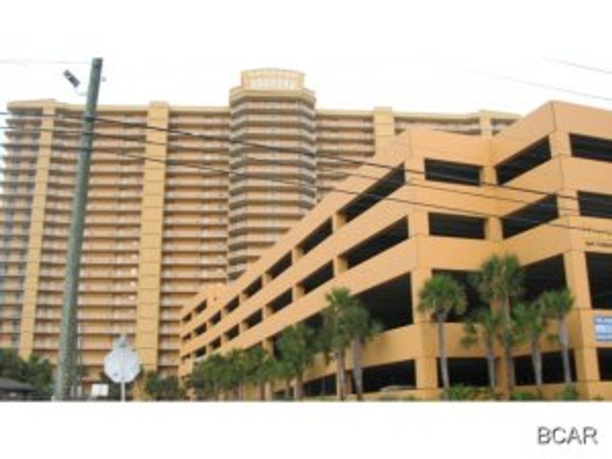 Nice 2 bedroom unit offering 9' ceilings, tile and carpet throughout as well as granite counter tops in the kitchen. The master bedroom, living room and dining area have gulf views. Both bathrooms are spacious and have marble counter tops and tile flooring. This Resort offers a large heated Gulf side pool and kiddie pool, 2 gazebos, assigned covered parking, 4 high speed elevators, fitness center, owners lounge with kitchen. This is a pet friendly resort.Short walk on the beach and to St Andrew St Park. Close to Marinas and Restaurants.