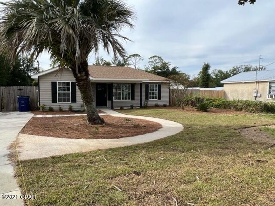 CURRENTLY UNDER CONTRACT, SELLER ACCEPTING BACKUP OFFERS. Fully remodeled 3 bedroom and 2 bath home. This like new property features stainless steel appliances, granite countertops, and a large fenced in landscaped backyard with a double gate for boat or trailer storage. Open concept split floorplan, master on one side with walk in closet. Stand alone laundry room off of kitchen. Two main living spaces, one in kitchen and one leading to backyard. New roof after hurricane Michael, 2019 replaced. This property is only a few blocks from great schools and Gulf Coast State College. Home is a 3 minute drive to Panama City Beach and a 10 minute drive to the closest beach access. As well as an 8 minute drive to Walmart and 7 minute drive to Publix.