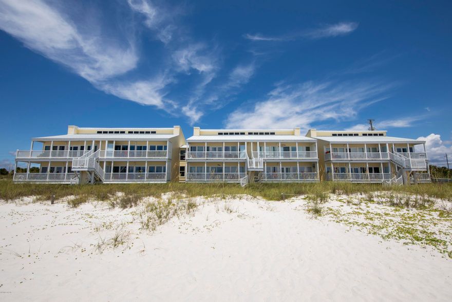 CURRENTLY UNDER CONTRACT, SELLER ACCEPTING BACKUP OFFERS.   Arms condos is a small quiet 11 unit gulf front condo complex located on the west end of Panama City Beach.  Undeveloped land on each side.  This unit is a first floor one level flat.  Park your car and walk right in.  This 3-bed 3-bath condo has more than 1,500-SF of living space and approximately 30-feet of windows on the beach side looking right across the sea oats dunes to the beautiful beach.  Walk right out the back door to step out to the World's Most Beautiful Beaches.  Better hurry, this is priced right and will sell!!