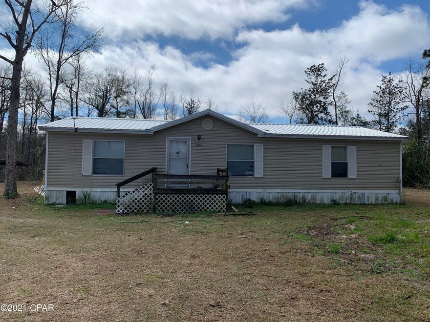3 Bedroom 2 Bath Mobile home on 4.2 acres close to town.  Home features an open living, dining and kitchen.  Features include a split floor plan, a walk-in shower in the master bath and a large breakfast bar in the kitchen.  Home is situated at the end of Ellenora Lane and has a nice quiet spacious yard, perfect for enjoying the outdoors.  Close to restaurants, stores and easy access to the interstate.  Home is currently being used as a rental and will require 24 hour notice for showings.  Make an appointment today to see all this home has to offer.