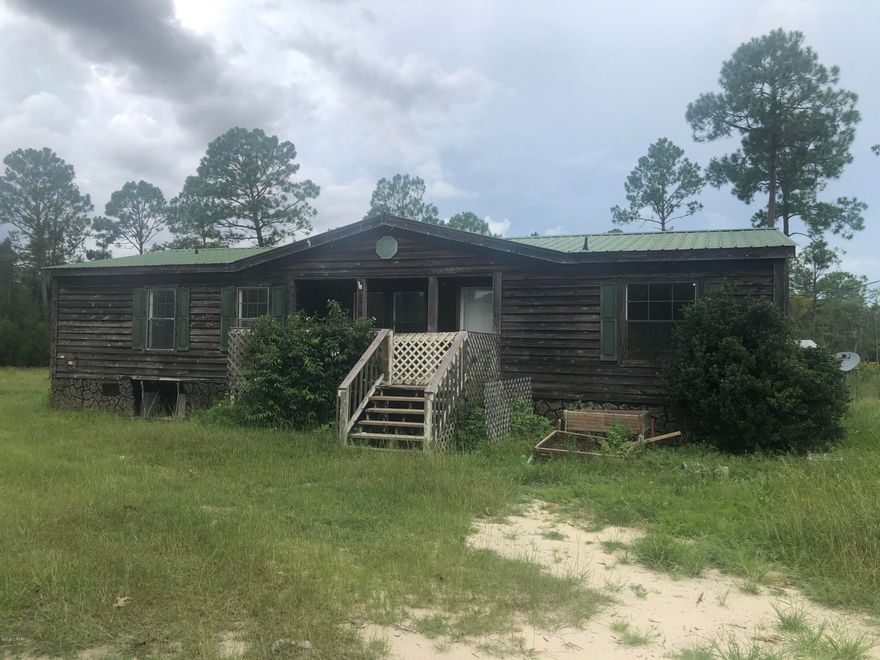 3 bed, 2 bath mobile home on over 10 acres of land in Southport. Situated off Highway 388, this home is away from the busyness of being 'in town', offering plenty of peace and privacy. This home features an open living room, dining area, and kitchen floor plan. The master bedroom is spacious with a private en suite. The master bathroom has a garden tub and separate shower. The two guest bedrooms share a guest bathroom with a shower/tub combo. There is also a large deck out back that is great for hosting friends and family while enjoying the outdoors. This property has a plethora of room for outdoor activities and landscaping. There is an established horse barn on the property.  The outdoor opportunities are endless.
